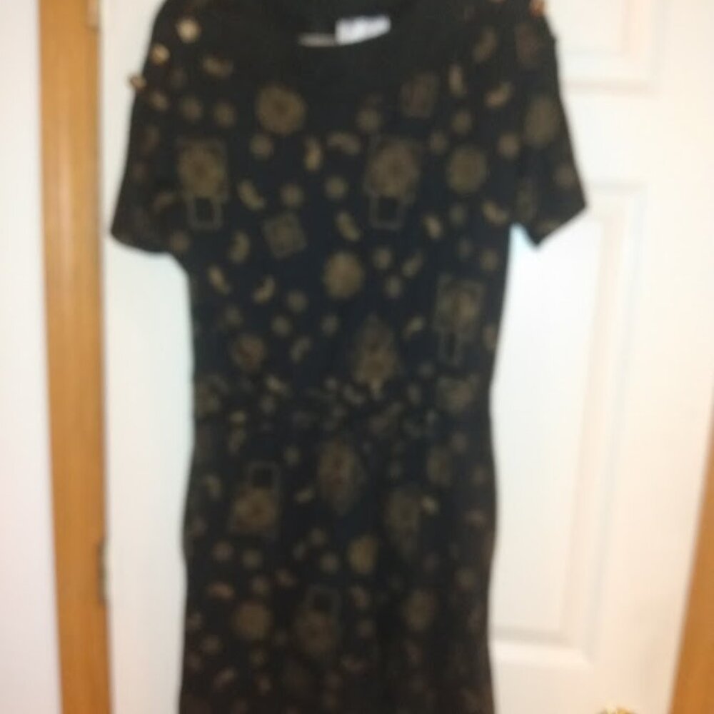 Adolfo Sport: Short black & gold romper zip back closure. Size Medium. Two pocke